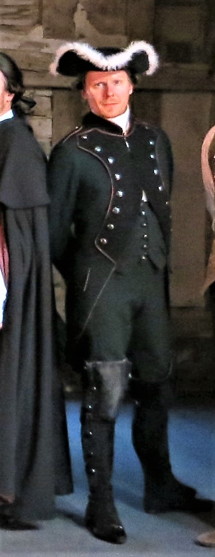 A dark green and black 18th Century style military uniform (jacket, waistcoat and breeches). Ex Royal Opera House - Soldier 'The Barber of Seville' 1993
